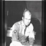 Orland Thomas Lloyd sitting in uniform.jpg