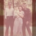 Elton E Harris SFC and Parents with his first baby.jpg