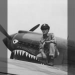 Lt. R.E. Smith, Cincinnati, Ohio, Of The 16Th Fighter Squadron, 51St Fighter Group, Poses On The Wing Of His Curtiss P-40 "Katydid" At Peishihwa, China.  20 October 1942. - Page 1