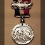 US_Colored_Troops_medal_-_1865_-_Smithsonian_Museum_of_American_History_-_2012-05-15.jpg